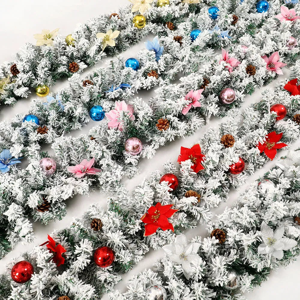 Christmas rattan garland with white flocking in a choice of five colours: golden, blue, silver, pink, and red.