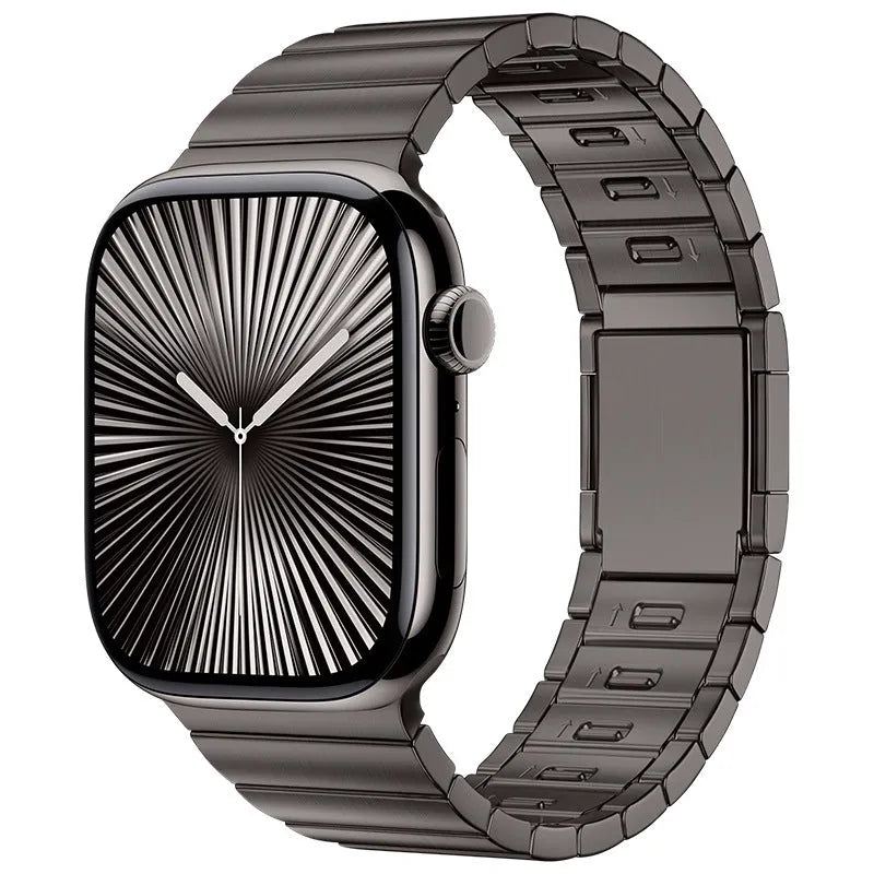 Silver stainless steel magnetic buckle strap for an Apple Watch on a wrist