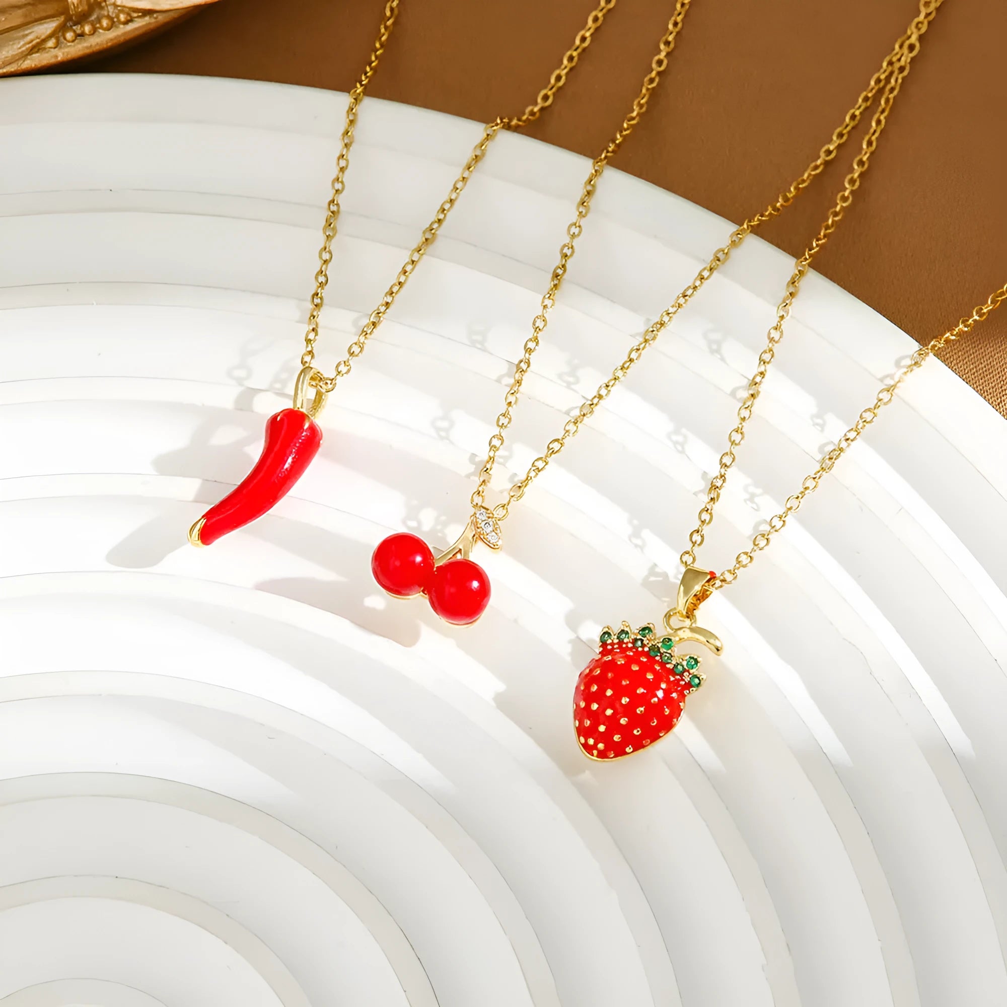 Women's titanium steel necklace with delicate strawberry, cherry and pepper charms on O-ring chain