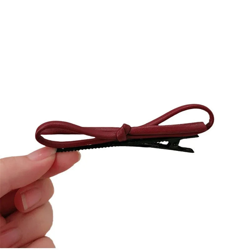 Wine red leather bow barrettes hair clips handcrafted construction