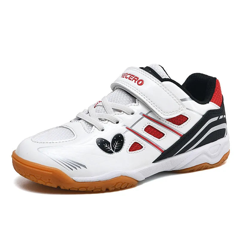 White and blue low top badminton shoes with a ribbed sole and breathable PVC upper.