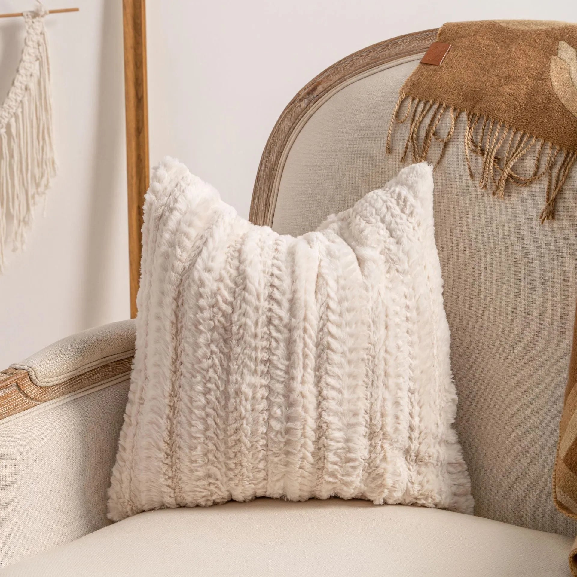 Knitted striped cushion cover with tassel decoration in a choice of six patterns.
