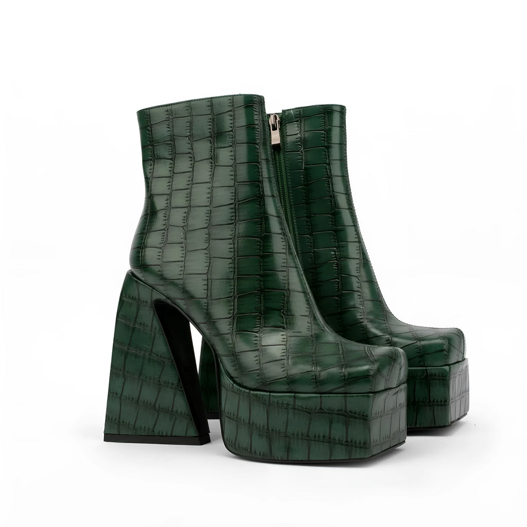 Women's ankle boot in artificial PU with a high heel above 8cm, shown in a solid colour.