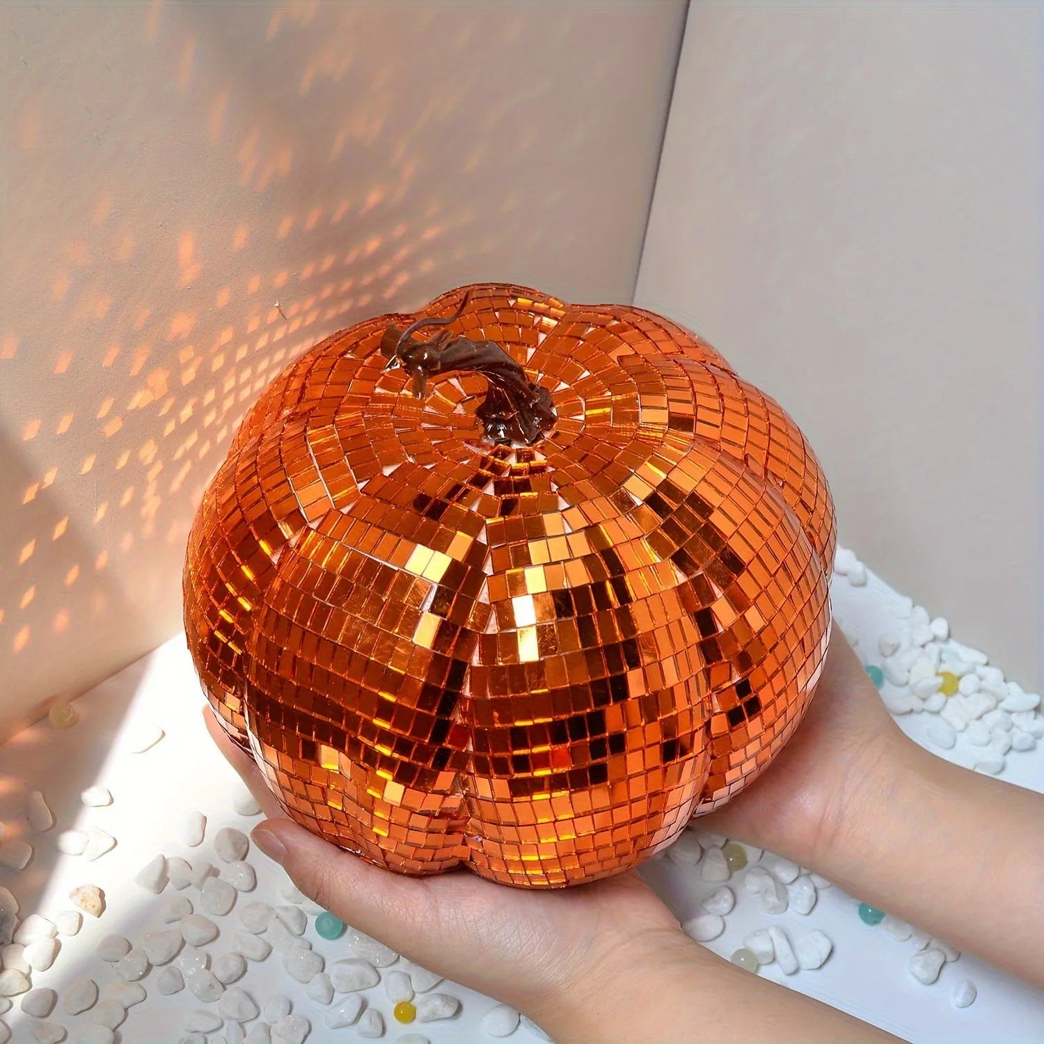 Glass pumpkin Halloween decoration in Chinese style, showing textured embroidered surface