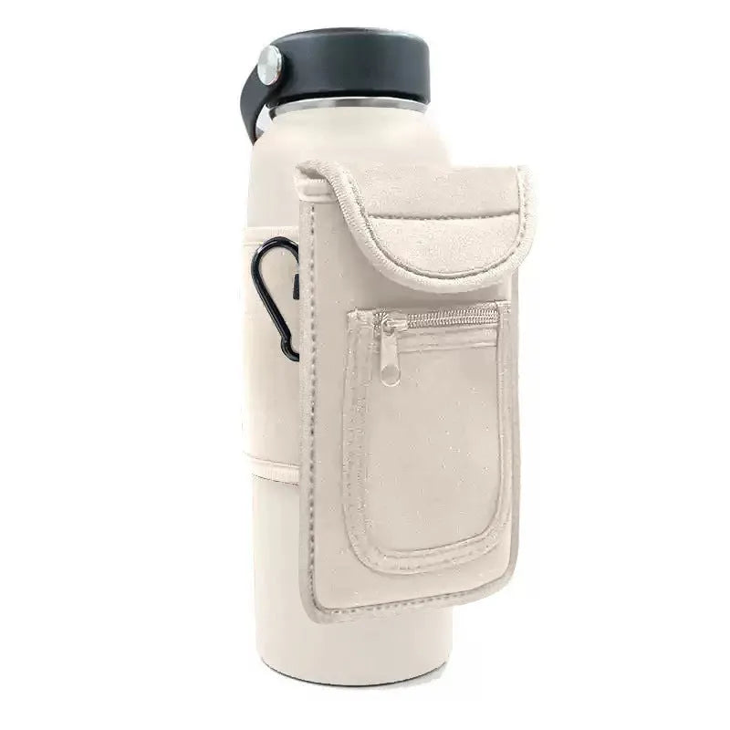 Fitness magnetic cup sleeve in grey with carabiner buckle, holding a large black sports water bottle.