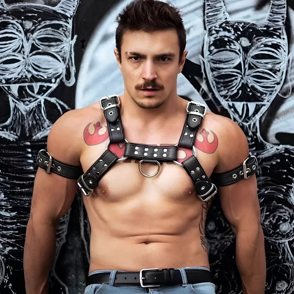 Black leather chest muscle bondage strap with metal buckle and rivets on a mannequin