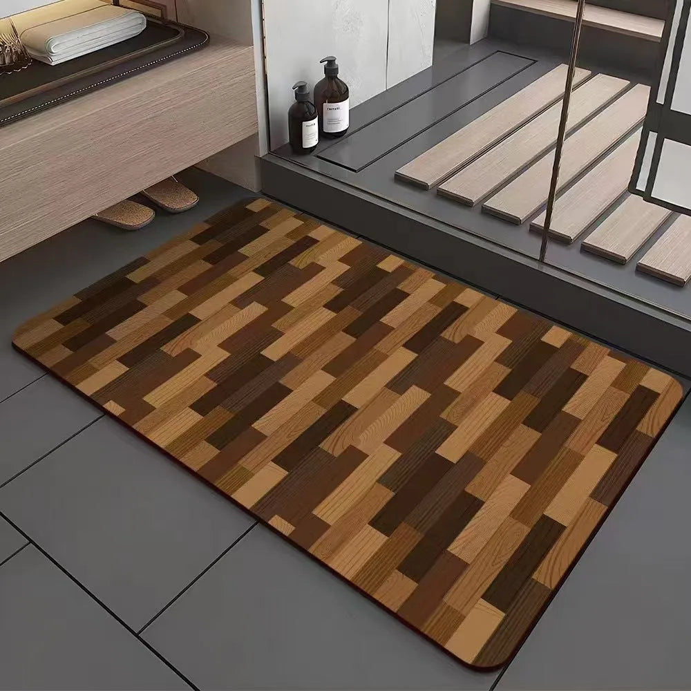 Square diatomite bathroom floor mat with geometric print in a wood grain colour on a tiled floor.