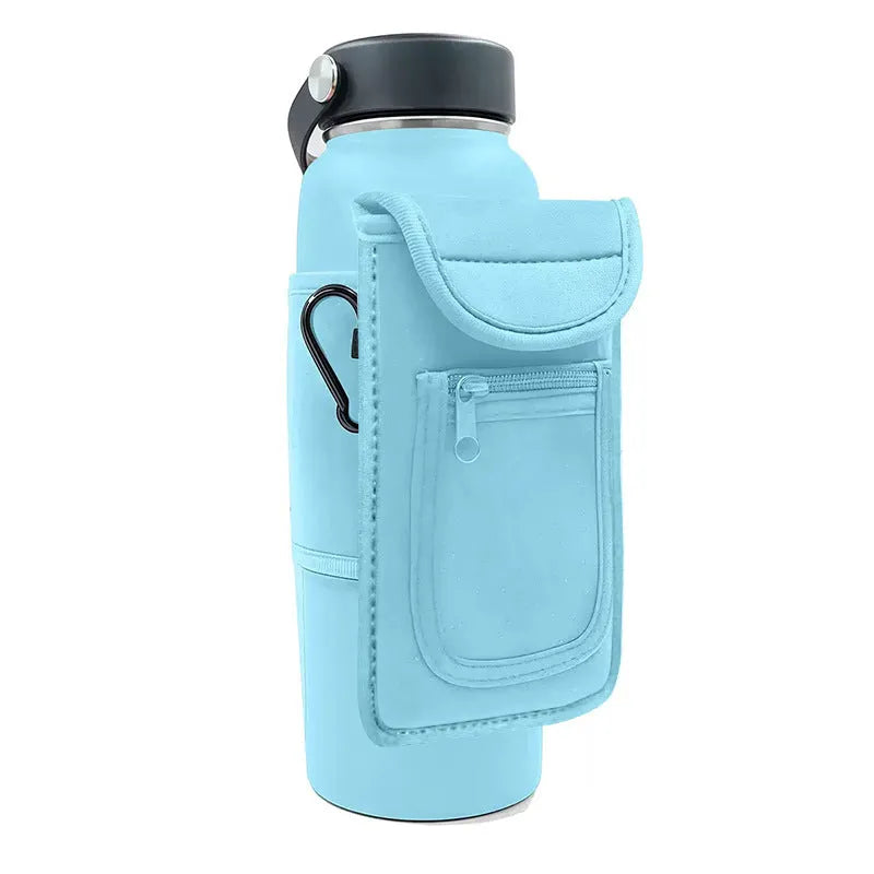 Fitness magnetic cup sleeve in grey with carabiner buckle, holding a large black sports water bottle.