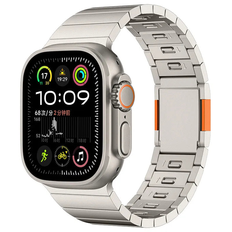Silver stainless steel magnetic buckle strap for an Apple Watch on a wrist