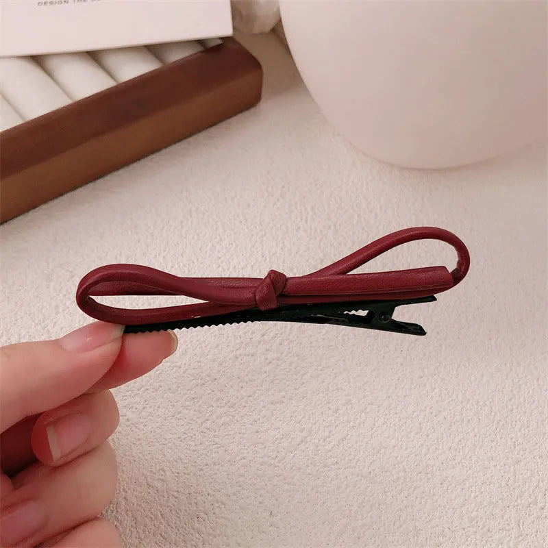 Wine red leather bow barrettes hair clips handcrafted construction