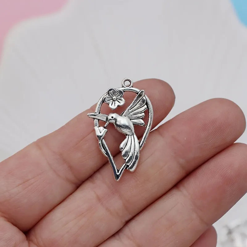 Alloy magpie bird pendant with electroplated finish in colour P234 for DIY jewellery making