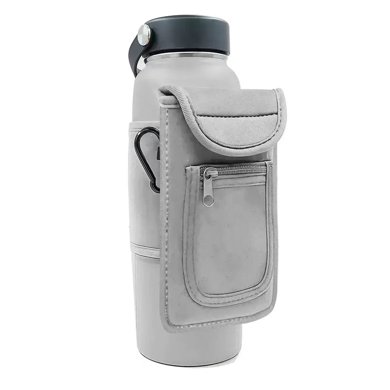 Fitness magnetic cup sleeve in grey with carabiner buckle, holding a large black sports water bottle.