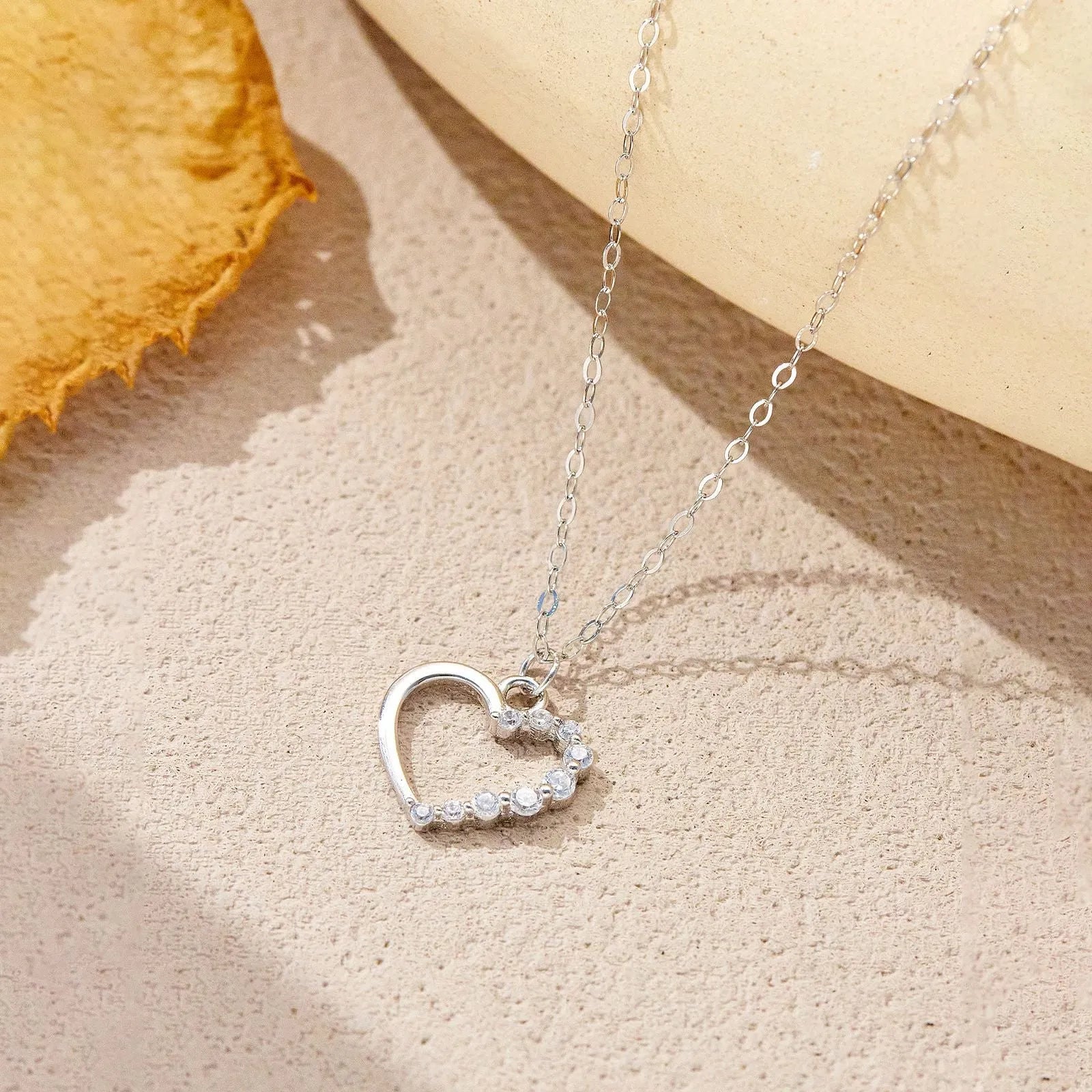 S925 sterling silver hollow heart necklace for women with choice of gold or platinum plating