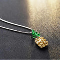 Silver geometric pineapple diamond pendant necklace on an adjustable chain.