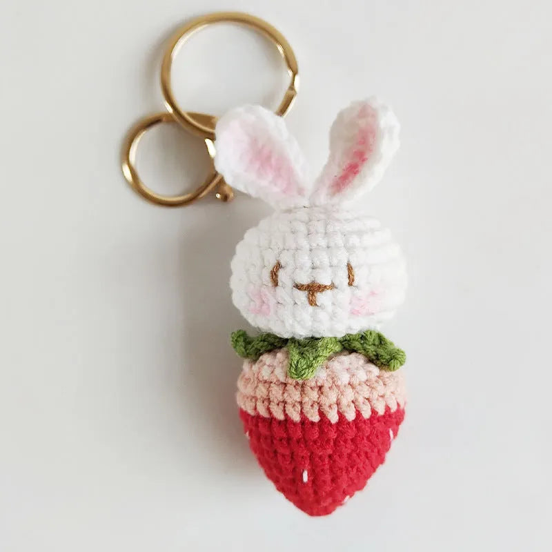 Hand-woven white rabbit strawberry pendant with keychain in cartoon style