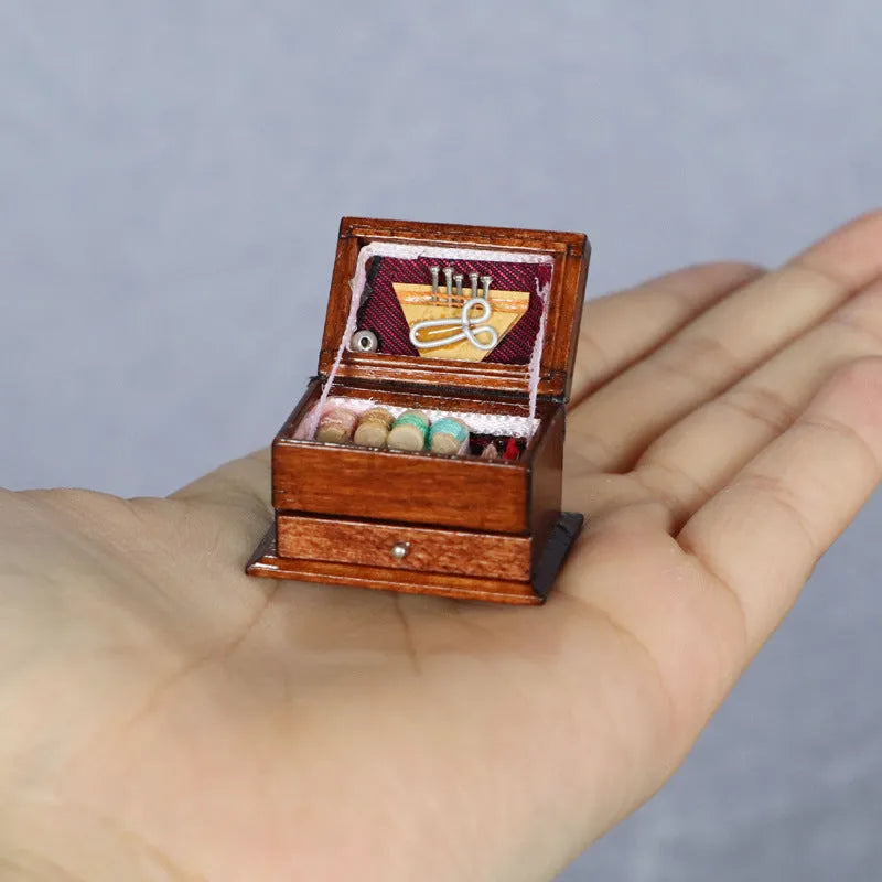 Miniature European-style wooden sewing box ornament with birch construction measuring 2.2cm by 3.4cm