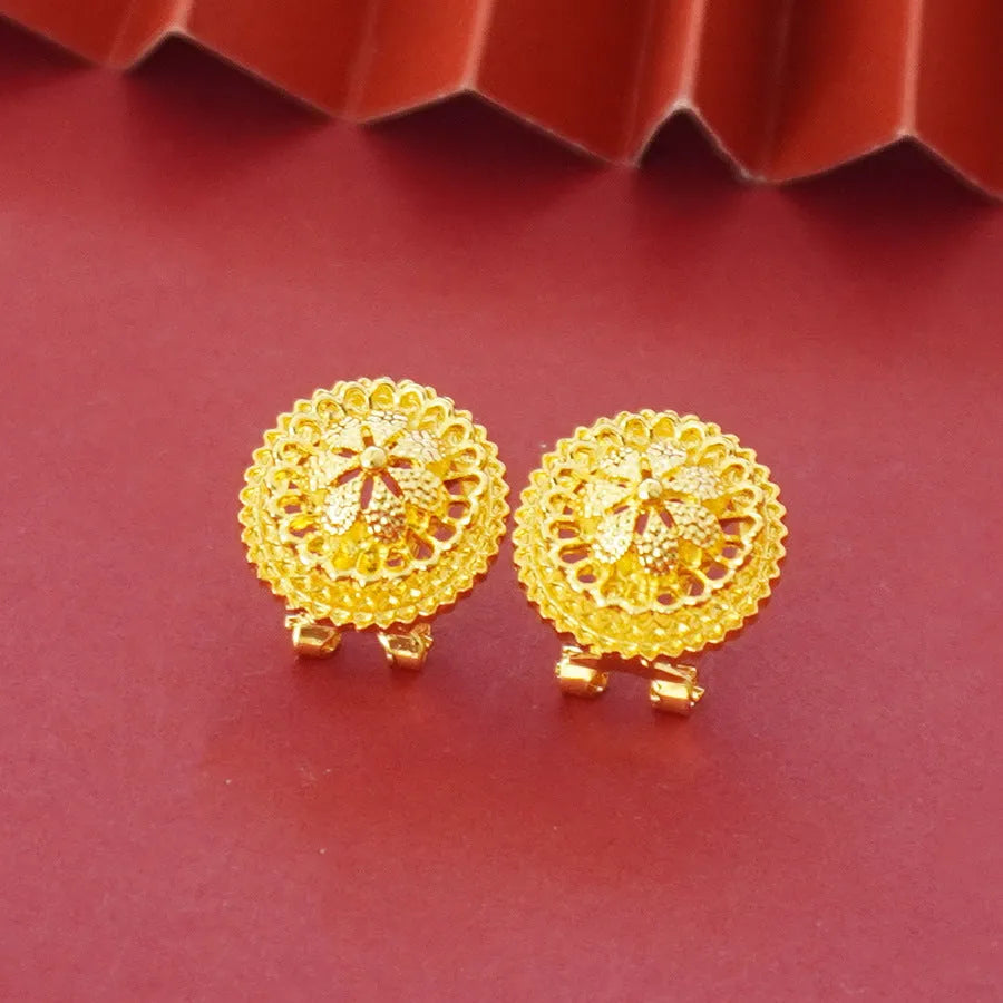 Gold-plated three-piece jewelry set showing necklace, earrings, and ring with a detailed flower design pendant.