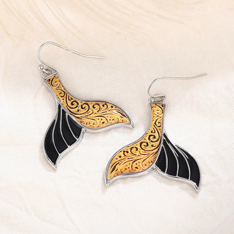 Women's retro fishtail earrings with whale details in white gold colour alloy