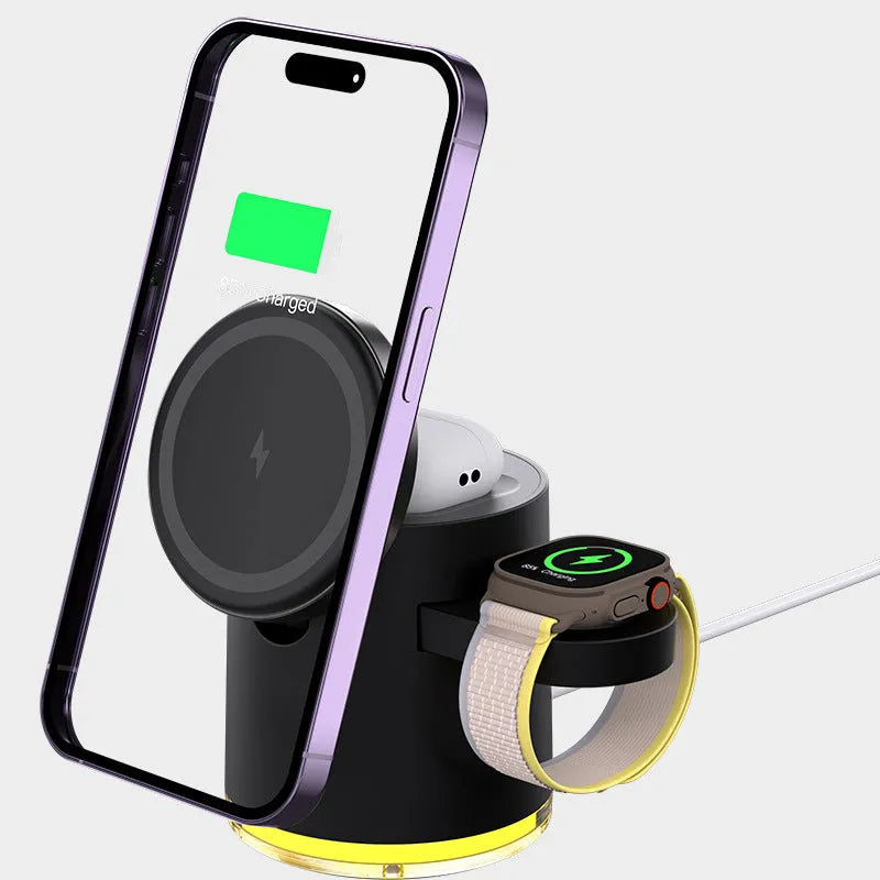 Black C16 three-in-one magnetic wireless folding charger for iPhone, Apple Watch and AirPods on a wooden desk.