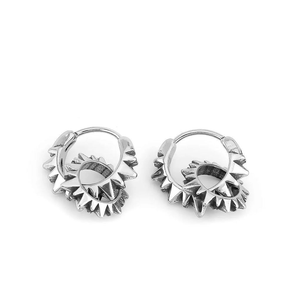 Pair of simple stainless steel round ring earrings with a polished finish and steel colour.