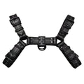 Black leather chest muscle bondage strap with metal buckle and rivets on a mannequin