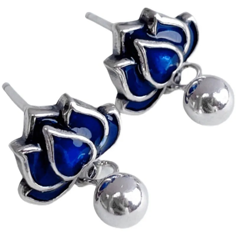 Blue lotus ear studs with lotus seedpod tassel design measuring 1.2cm width