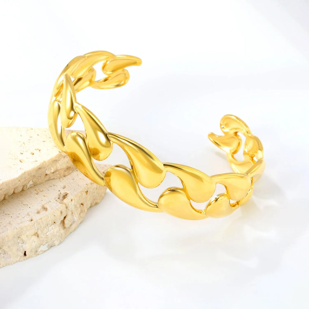 Advanced stainless steel alloy bracelet in European and American style on a wrist, showing a metallic finish.