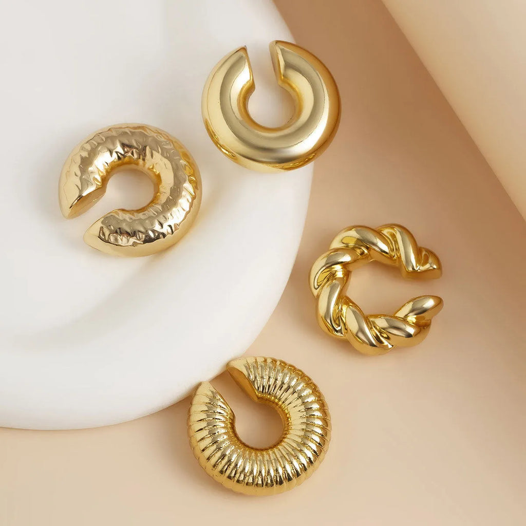 Geometric clip-on earrings for women in gold or silver tone, set of four pieces.