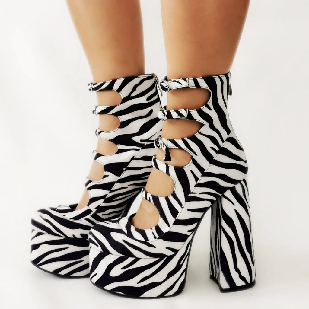 Black waterproof patent leather women's platform high heels with a thick heel and ankle buckle strap.