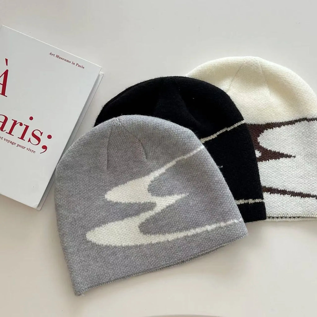 Acrylic thermal beanie hat in white, grey or black colours for autumn and winter wear
