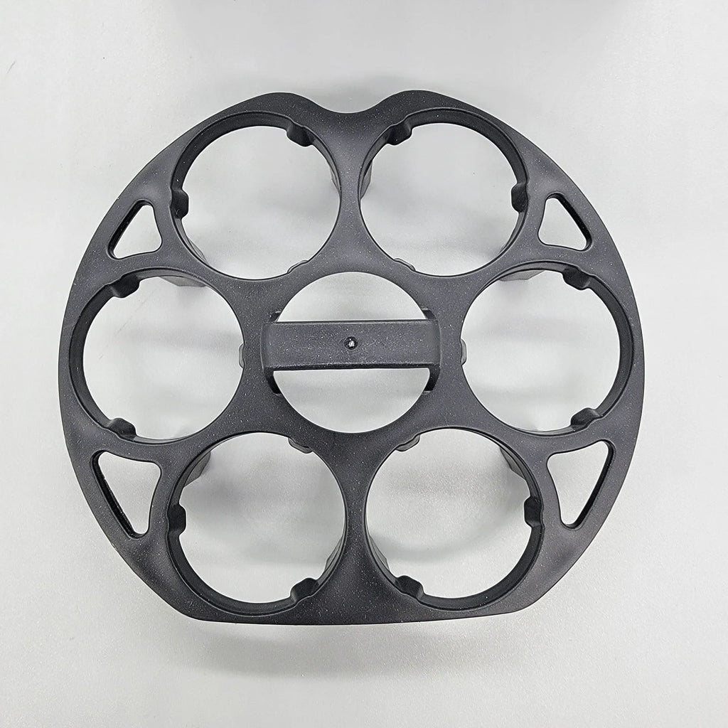 Black plastic egg holder cooking basket rack with modern design on a white background.