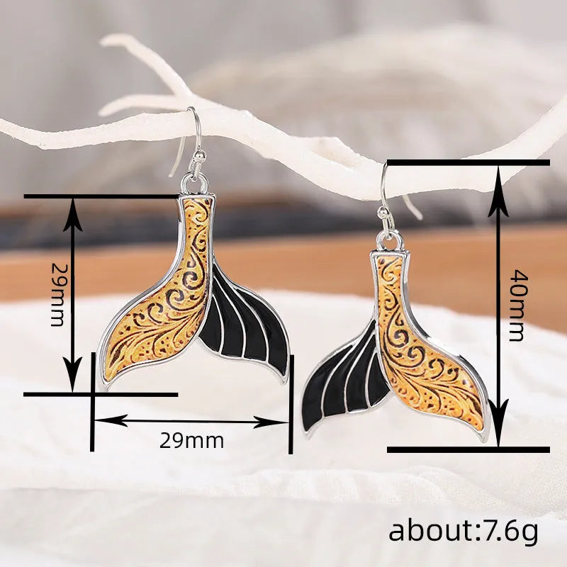 Women's retro fishtail earrings with whale details in white gold colour alloy