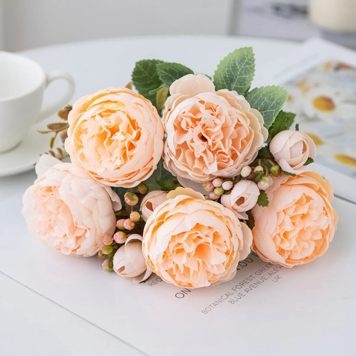 Artificial silk peony flower bouquet in a vase for home or wedding decoration