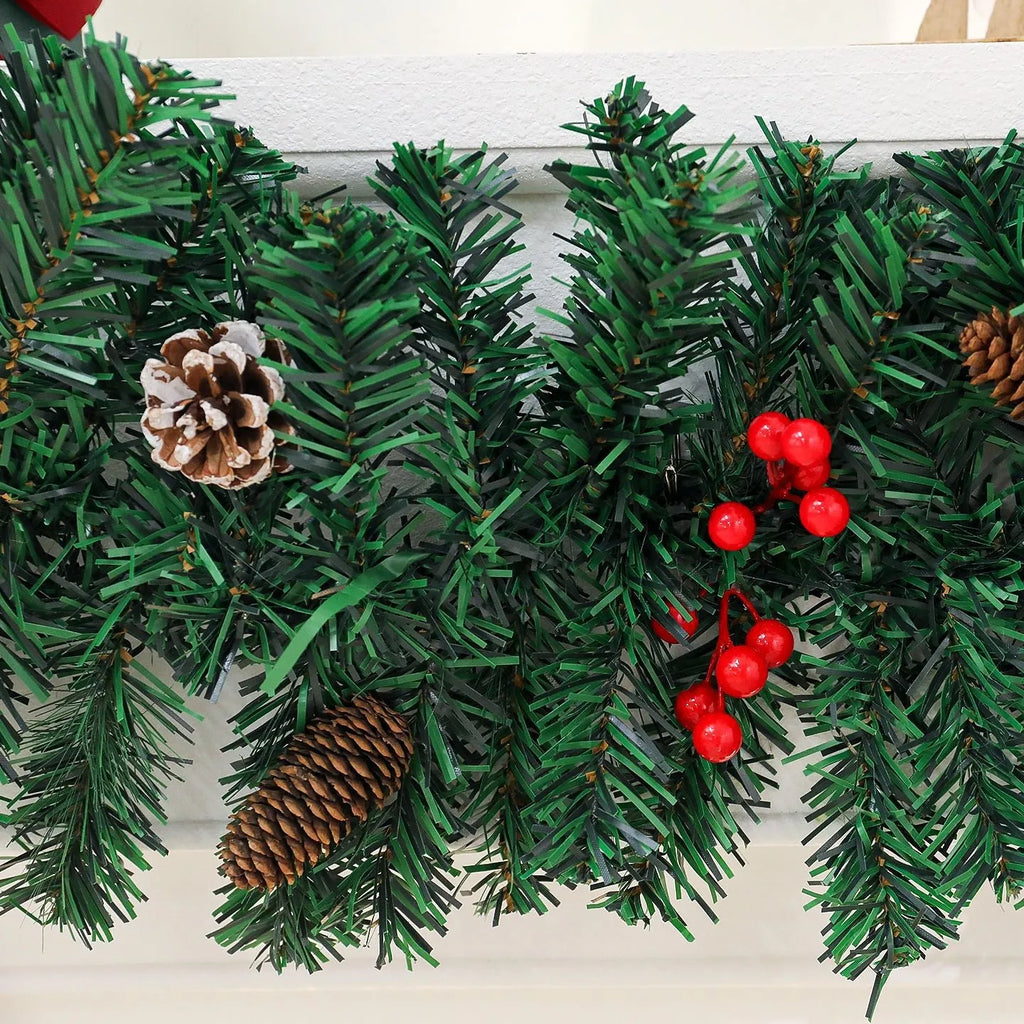 70cm tall Christmas rattan decorative cane with pine cone and red bow, shown on a festive table setting.