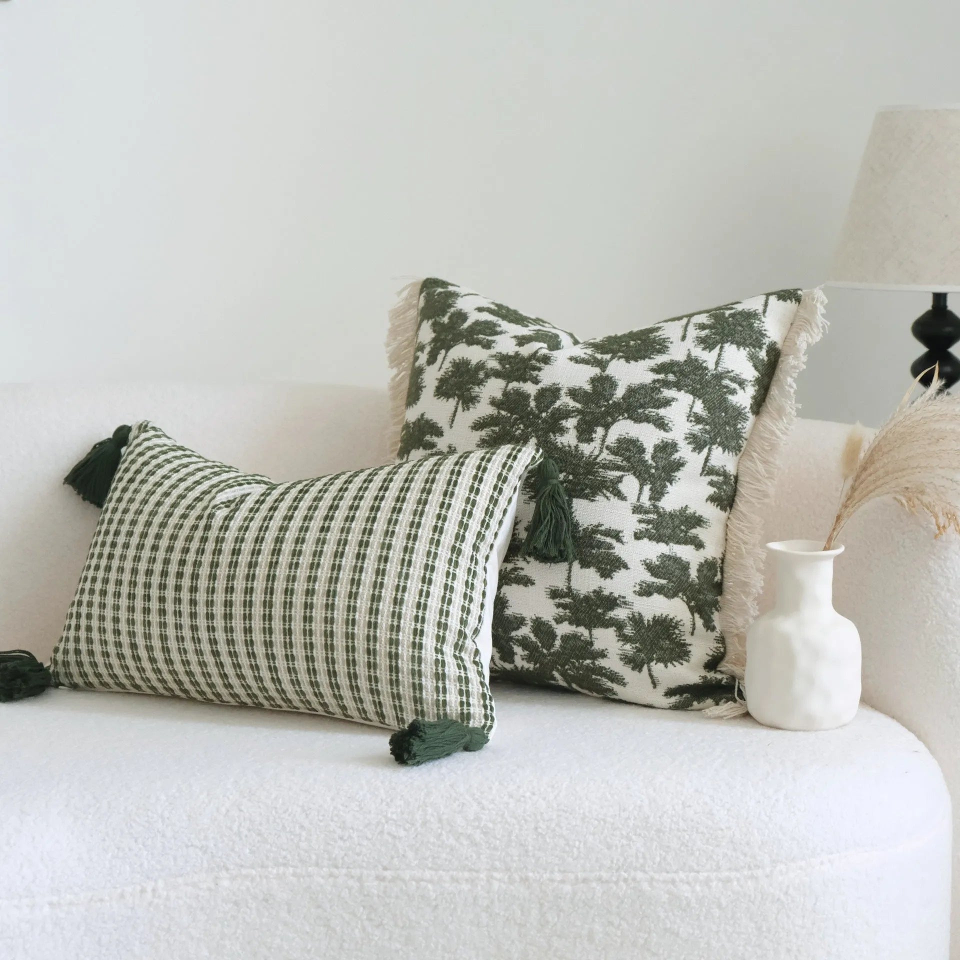 Green cotton and linen tassel hotel sample pillow with botanical pattern on brushed fabric pillowcase