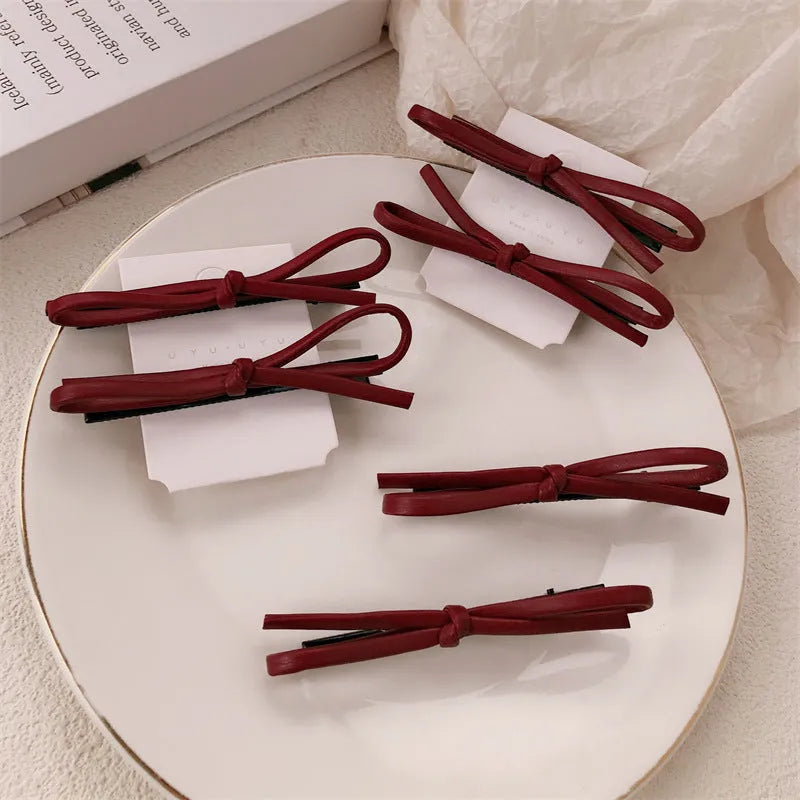 Wine red leather bow barrettes hair clips handcrafted construction