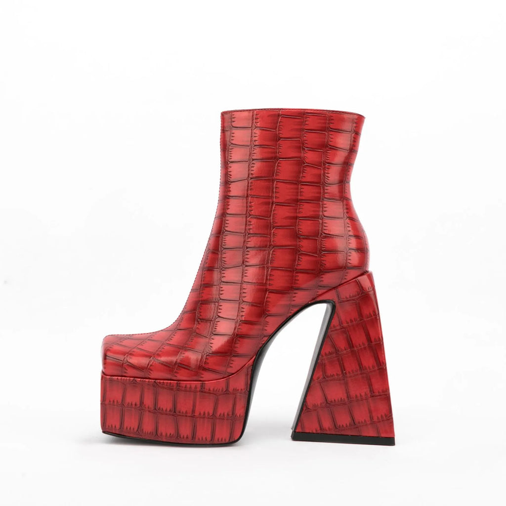 Women's ankle boot in artificial PU with a high heel above 8cm, shown in a solid colour.
