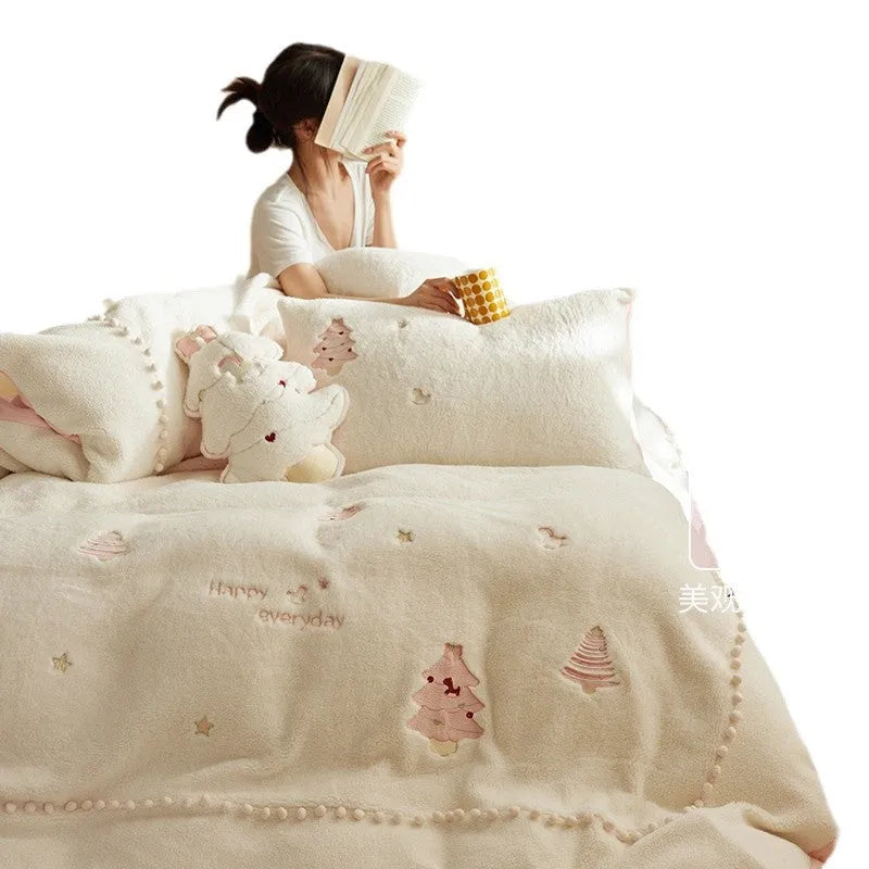 Milk fibre Christmas bedding set with reactive printed tree pattern shown on bed
