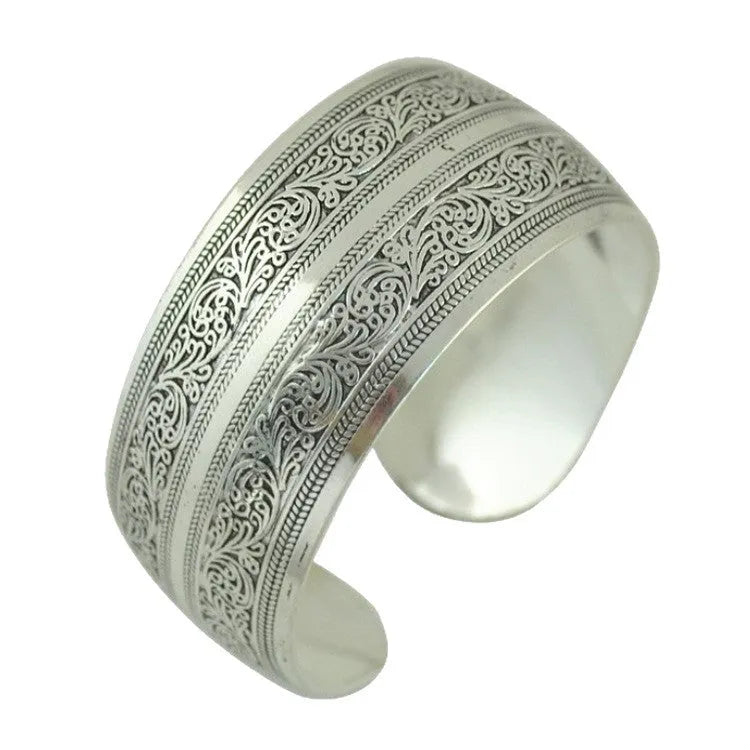 Carved open Miao silver bracelet with Roman shape design in turtle or elephant colour
