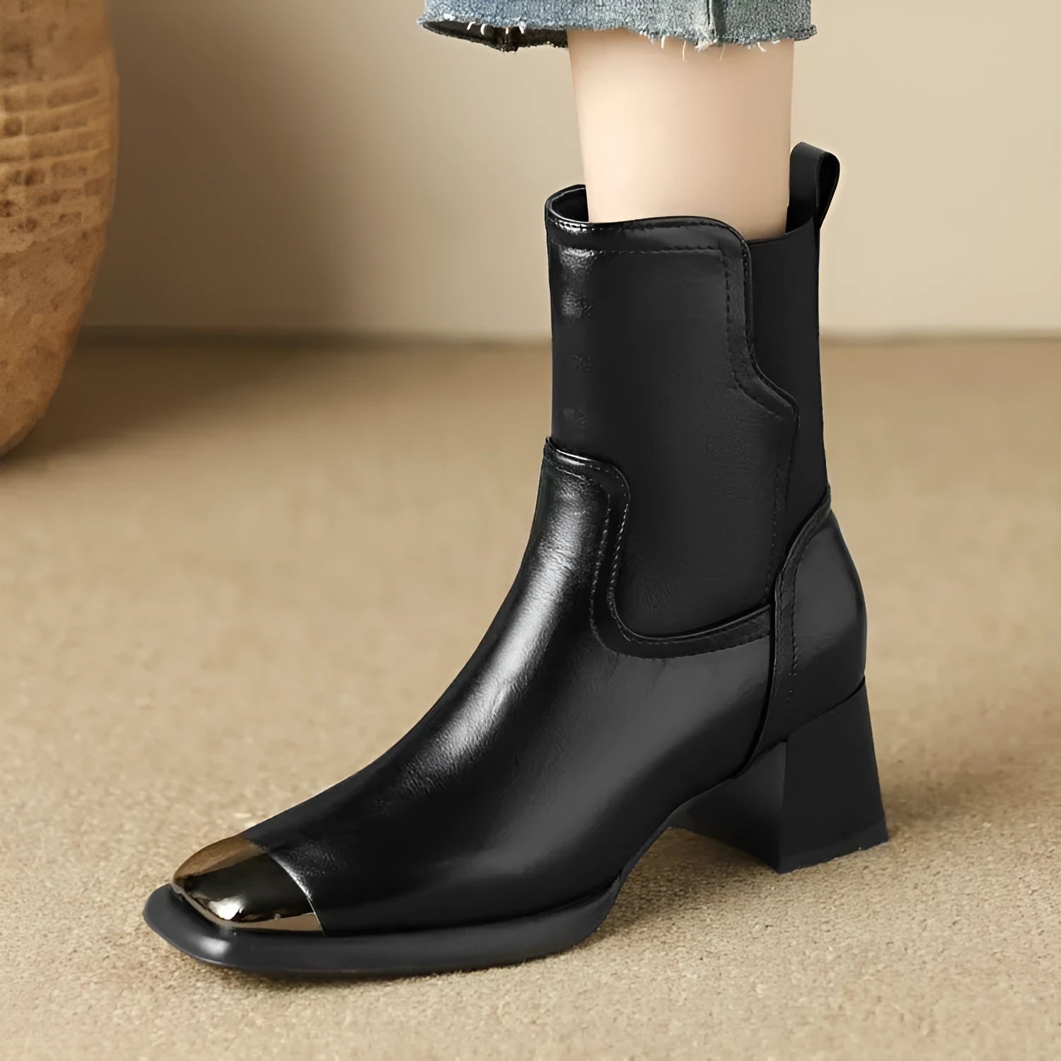 Brown cowhide leather Martin boots with a side zipper and low tube shaft.
