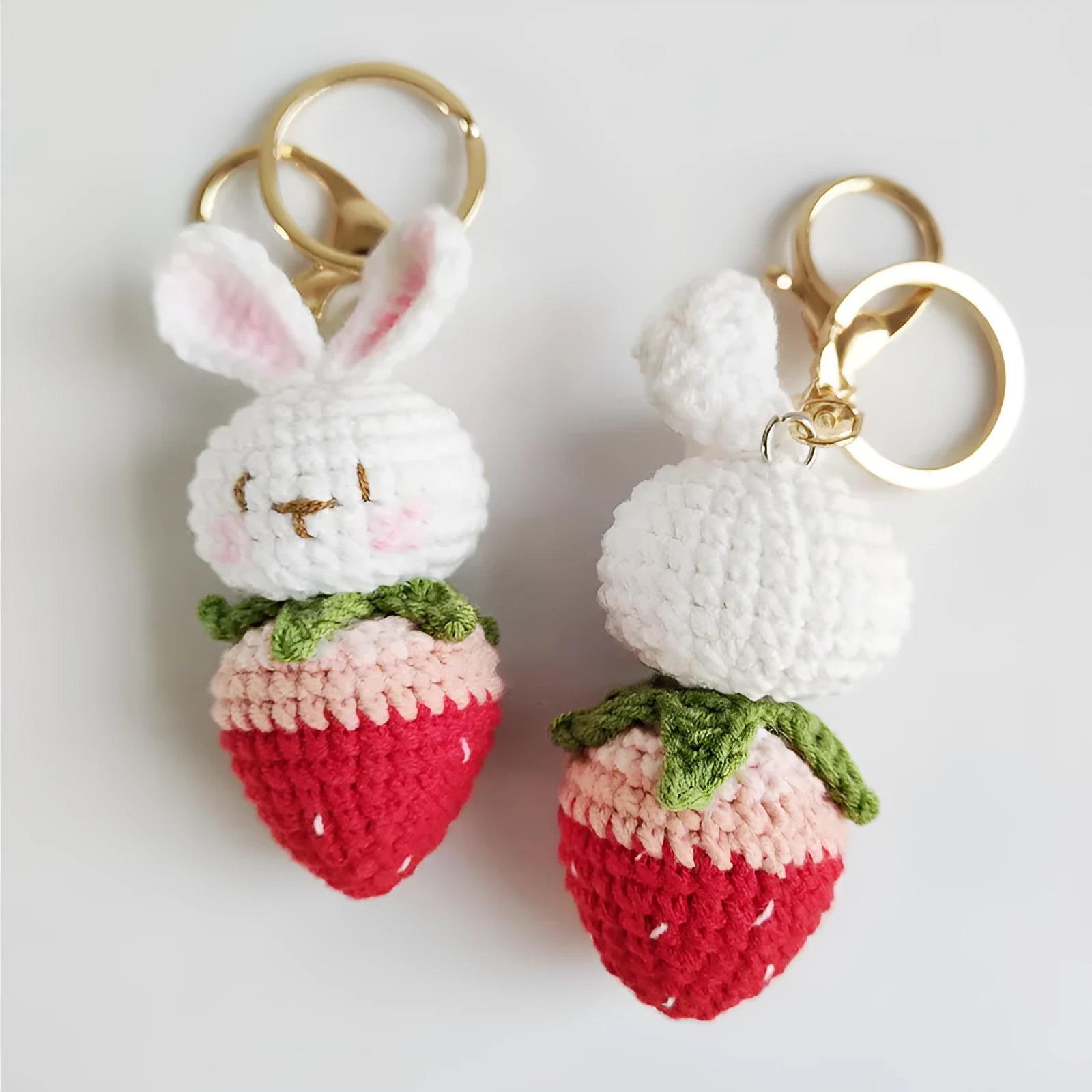 Hand-woven white rabbit strawberry pendant with keychain in cartoon style