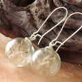 Transparent glass ball earrings with dandelion seed design and French hooks in silver or bronze finishes
