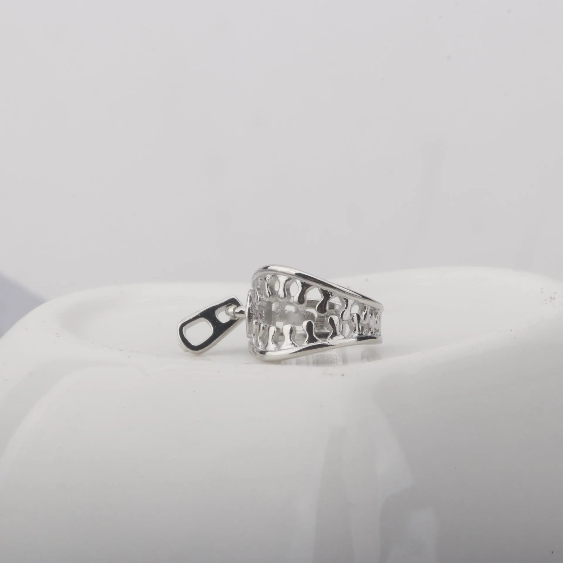 Copper geometric ear clips with line detailing and bone clip fastening in ES862 colour