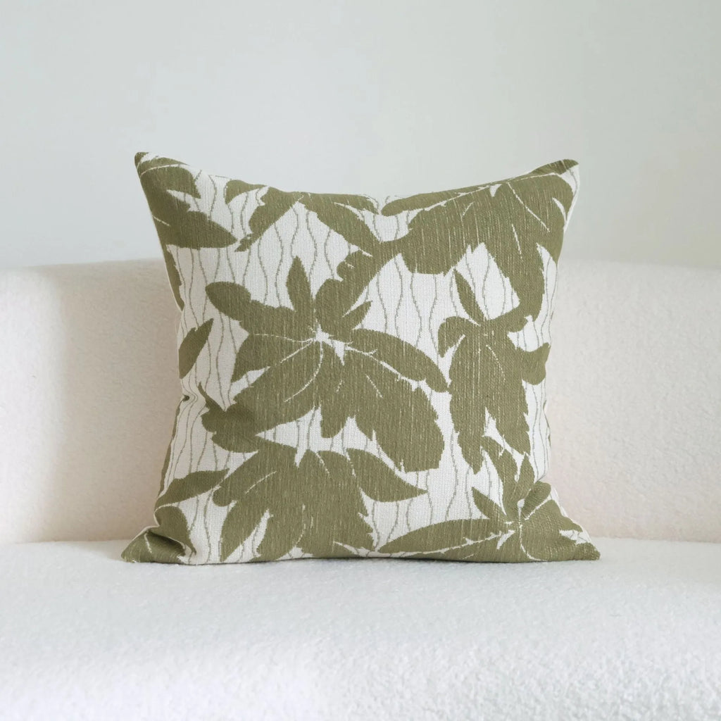 Green cotton and linen tassel hotel sample pillow with botanical pattern on brushed fabric pillowcase