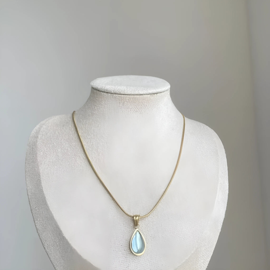 Water drop necklace with mixed gem pendant on titanium snake chain in blue or green.