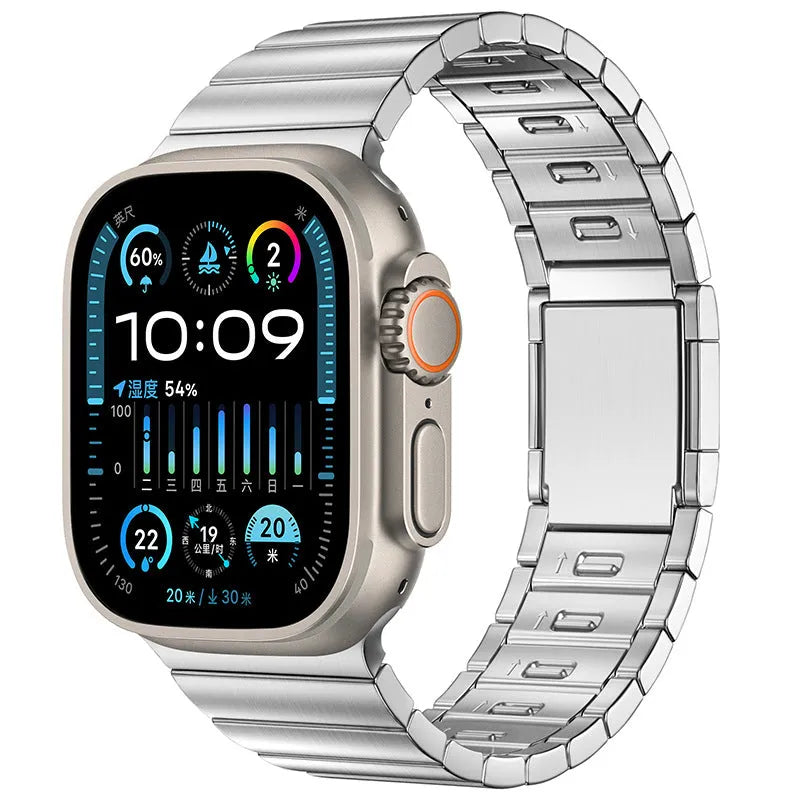 Silver stainless steel magnetic buckle strap for an Apple Watch on a wrist