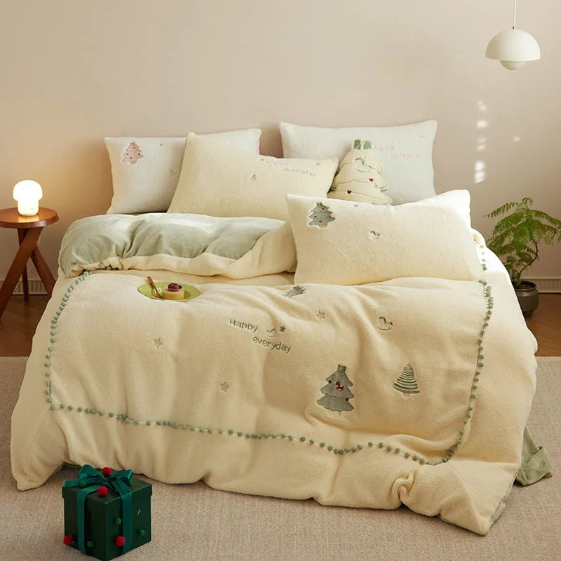 Milk fibre Christmas bedding set with reactive printed tree pattern shown on bed