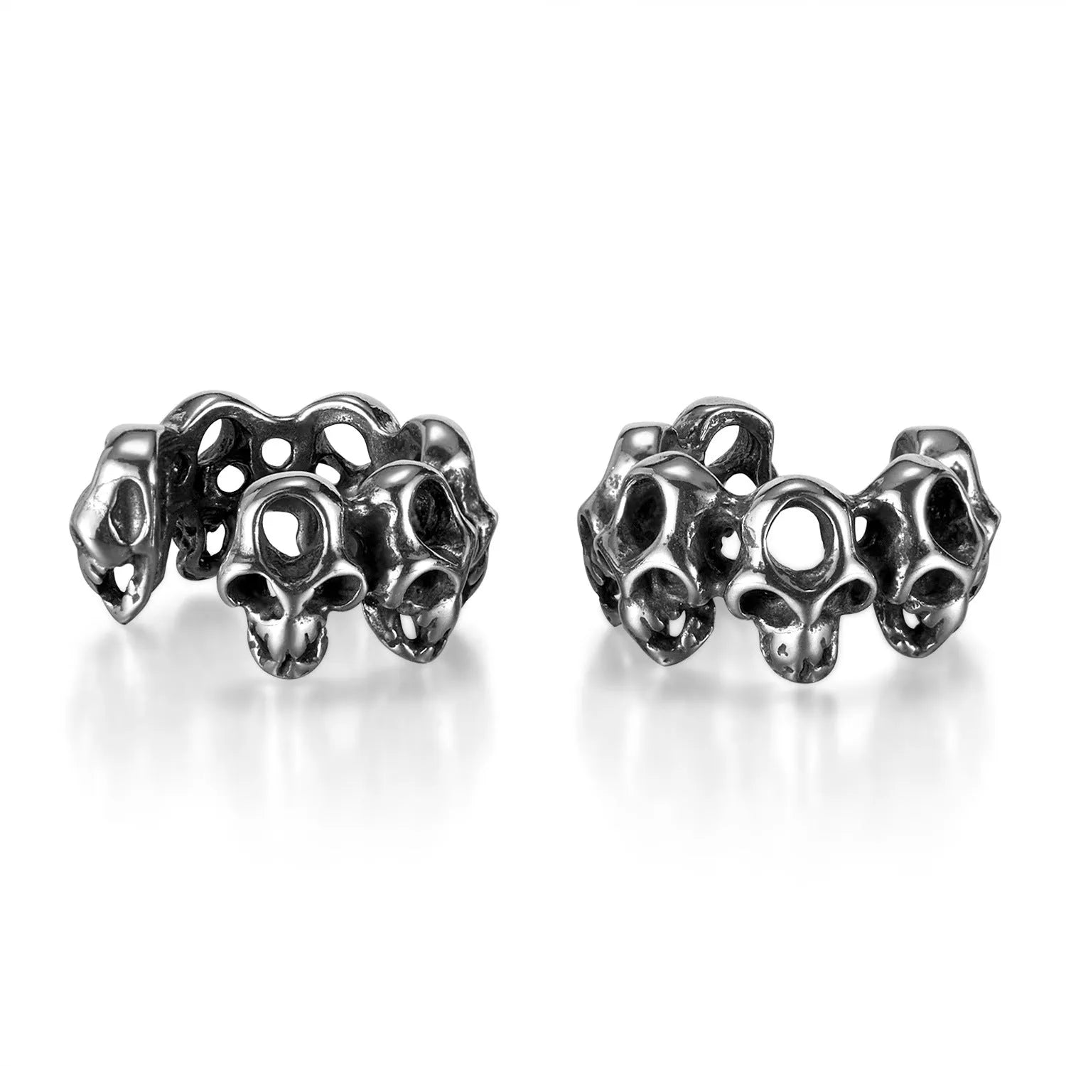 Steel hollow skull earrings with geometric design and ear clip fitting