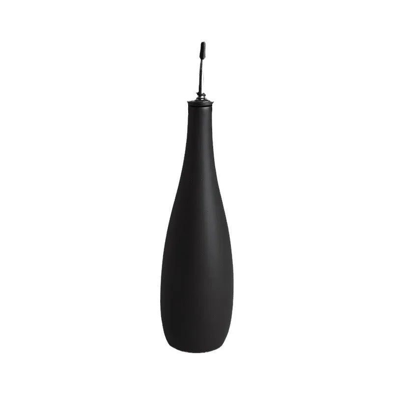 Ceramic oil pot with funnel and brush in 650ml capacity for kitchen oil storage