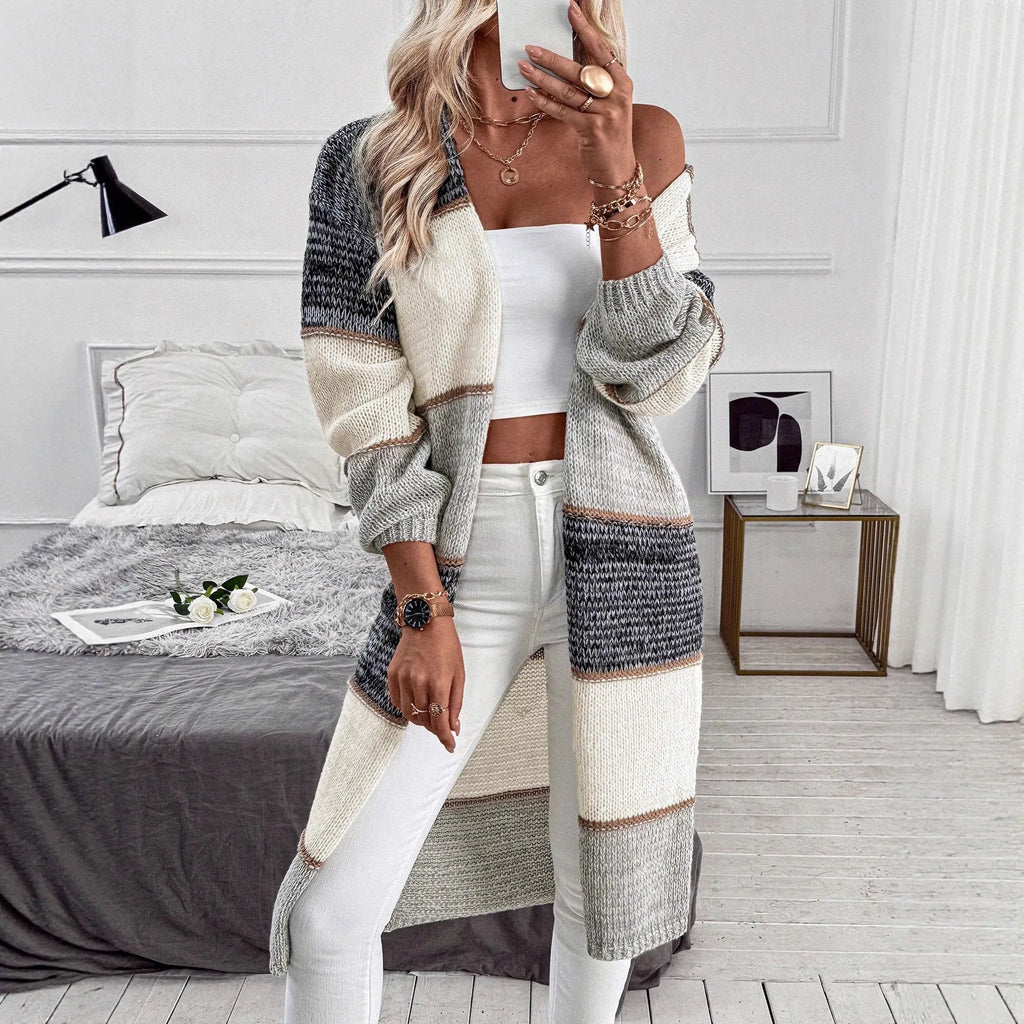 Grey knitted long cardigan with loose street fashion styling and long sleeves